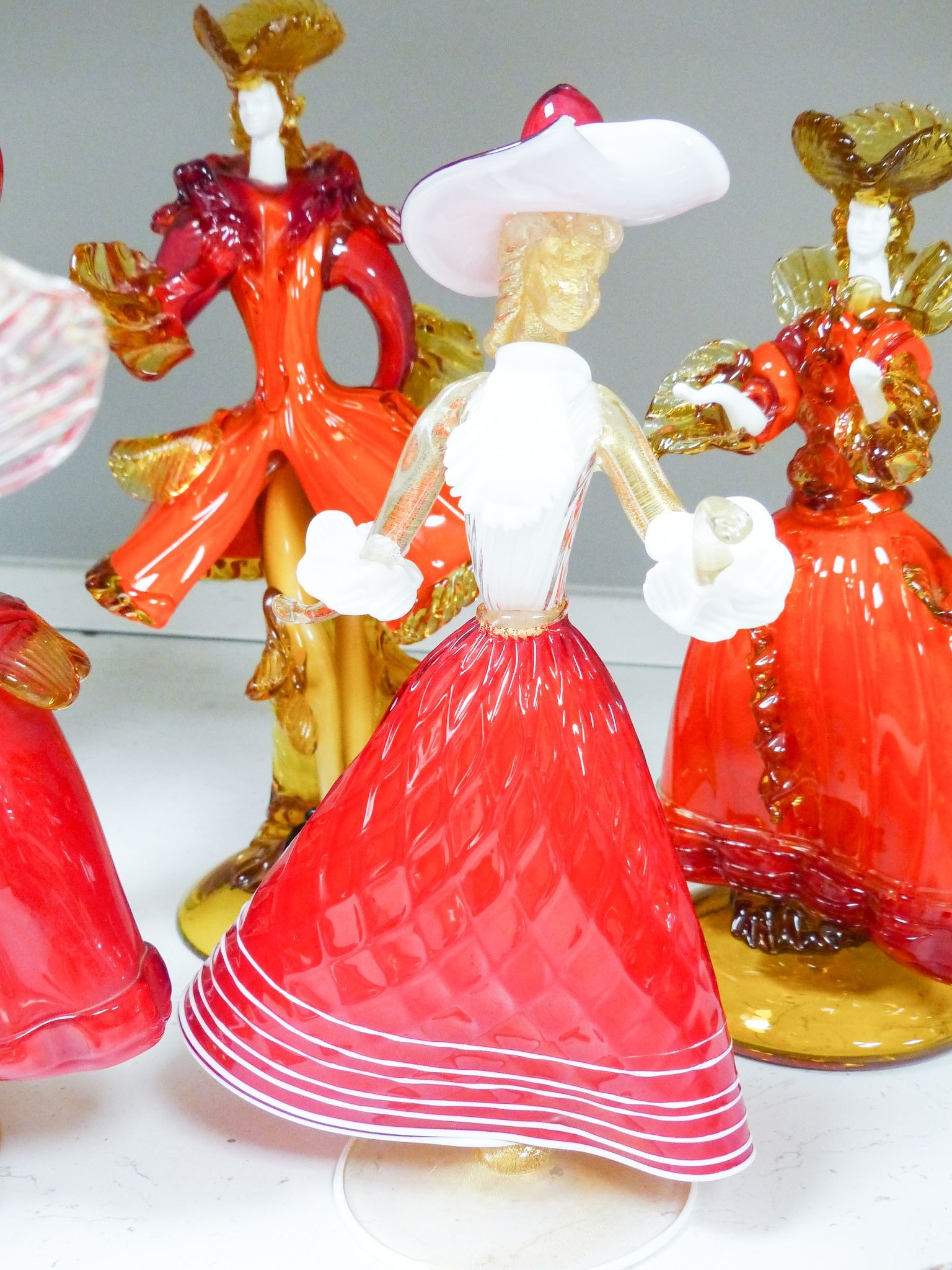 Six Murano glass figures of ladies and gentlemen, the tallest 47cm high